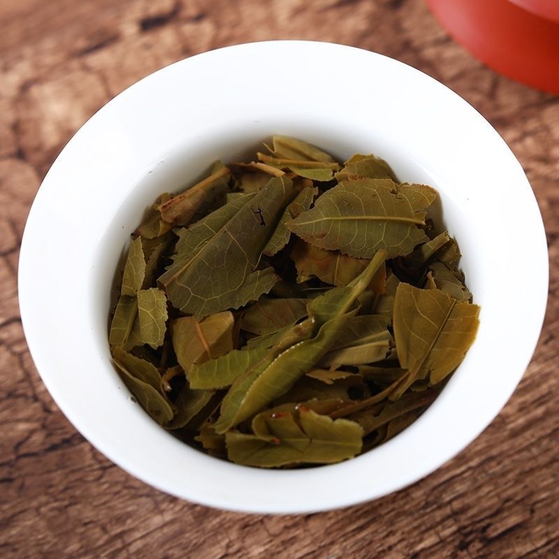 2013 QiaoMu Puerh Tea Age-Fermeted Cake Tea Haiwan Five Star Arbor Puer Tea 357g gallery