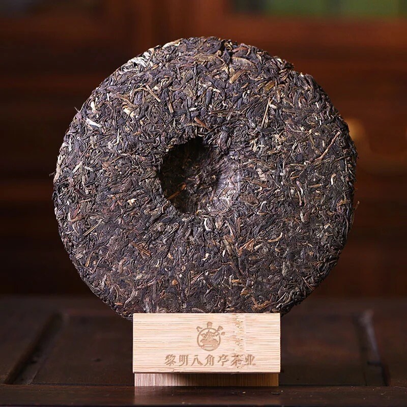 Li Ming Octagonal Pavilion Peacock Township Puerh Tea Cake 2007 357g Raw Puer gallery