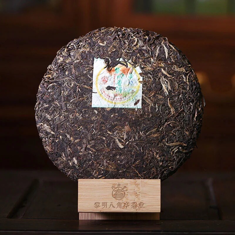 Li Ming Octagonal Pavilion Peacock Township Puerh Tea Cake 2007 357g Raw Puer gallery